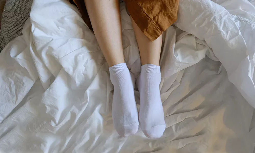 Sleeping with your socks on